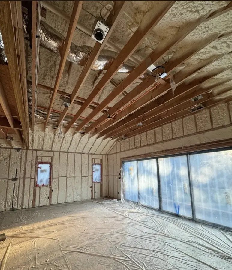 Interior walls and ceiling insulated with spray foam during new construction in Crozet